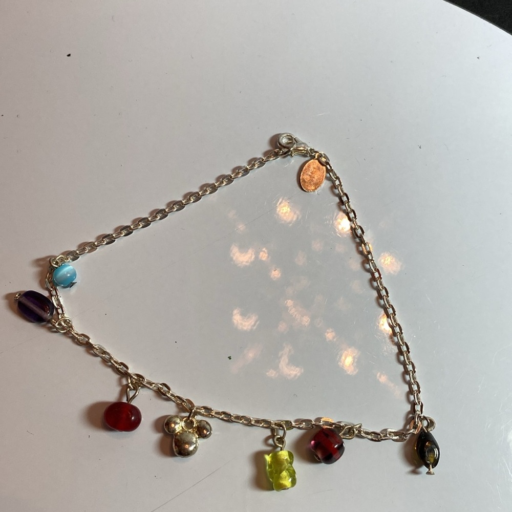 Disney silver tone ankle bracelet. 9 1/2” long.